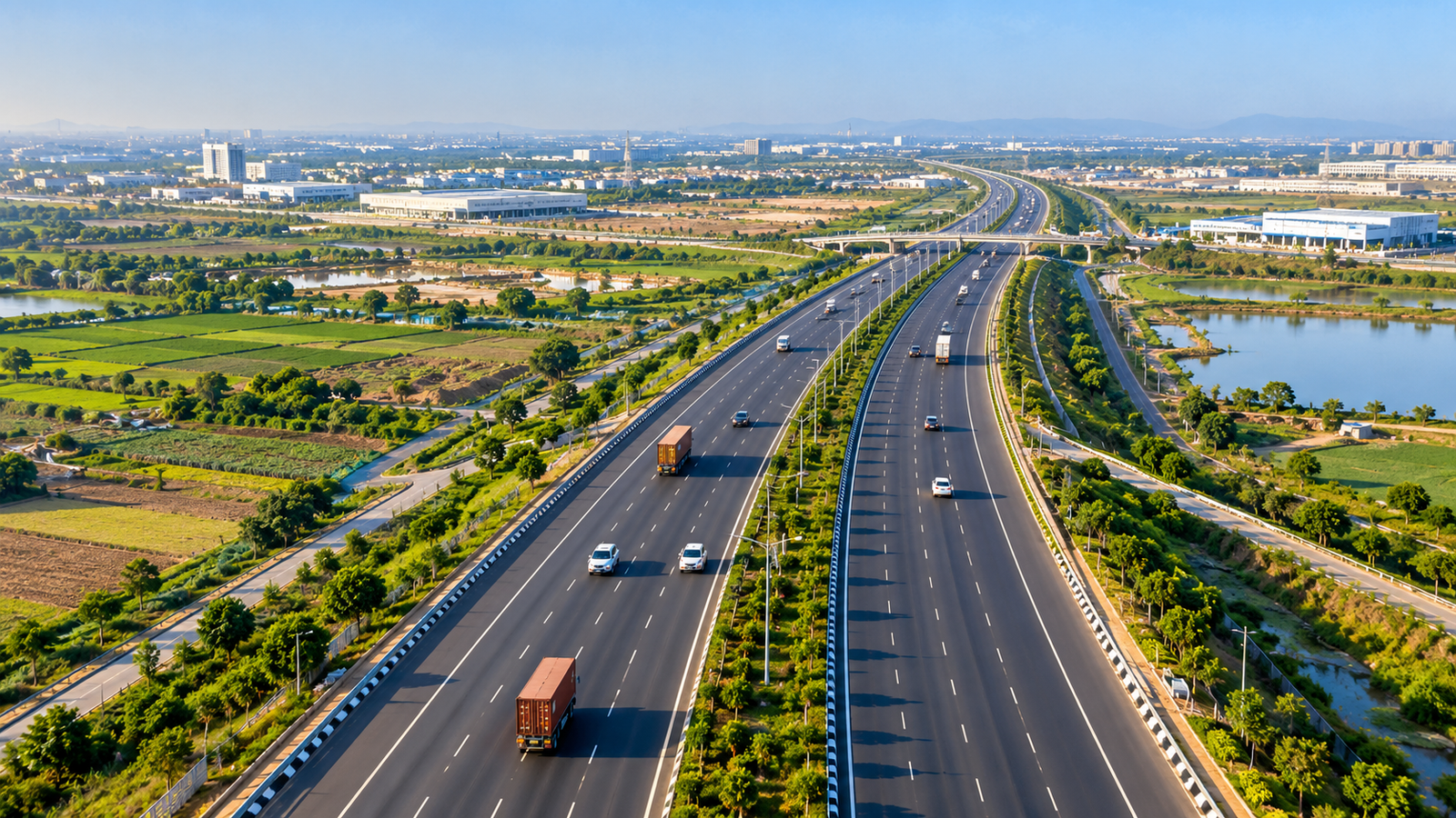 Aerial view of an expressway through a green industrial landscape, representing Ahmedabad Dholera expressway connectivity